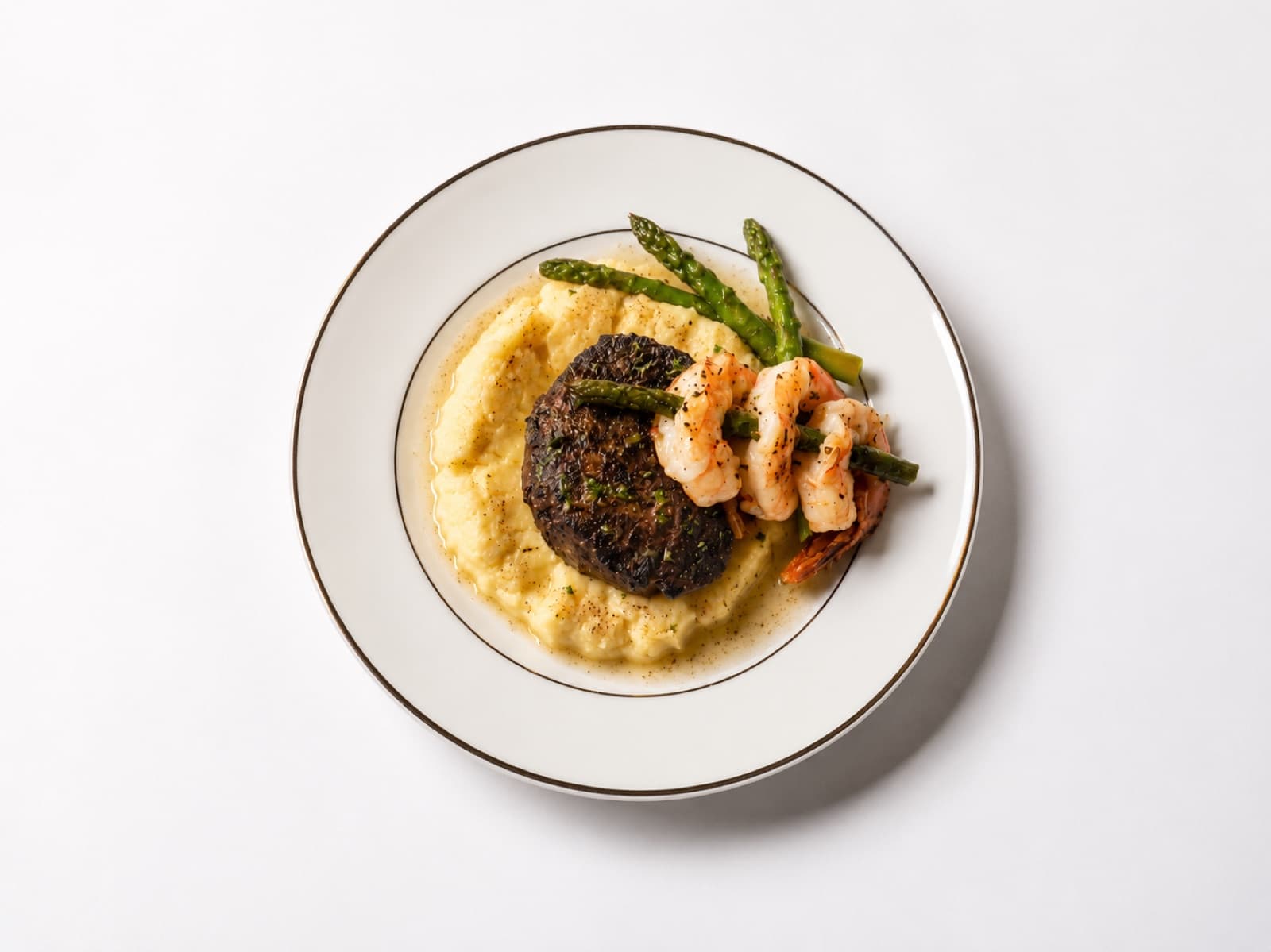 Crab cake with grilled shrimp, asparagus, and creamy polenta